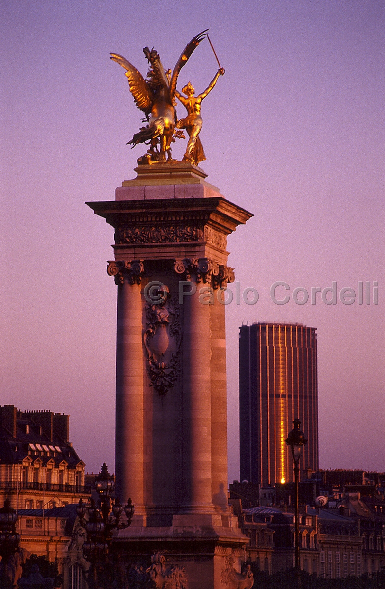 Statue over Alexander III Bridge and Montparnasse Tower, Paris, France
(cod:Paris 23)